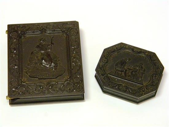 Appraisal: Two gutta percha daguerreotype cases decorated with figural scenes in