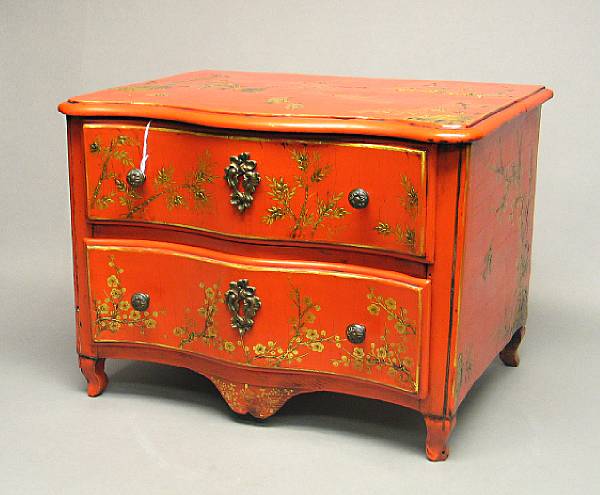 Appraisal: A Chinoiserie red and gold-painted small two-drawer chest Its top