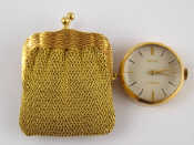 Appraisal: Cartier A French hallmarked carat gold purse watch the dial