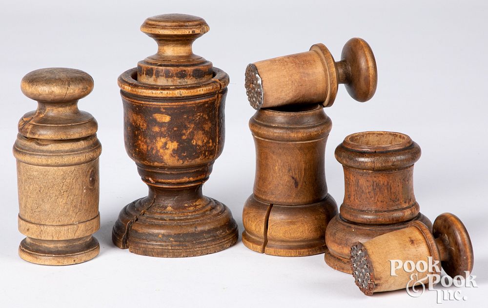 Appraisal: Four Scandinavian turned wood herb grinders Four Scandinavian turned wood