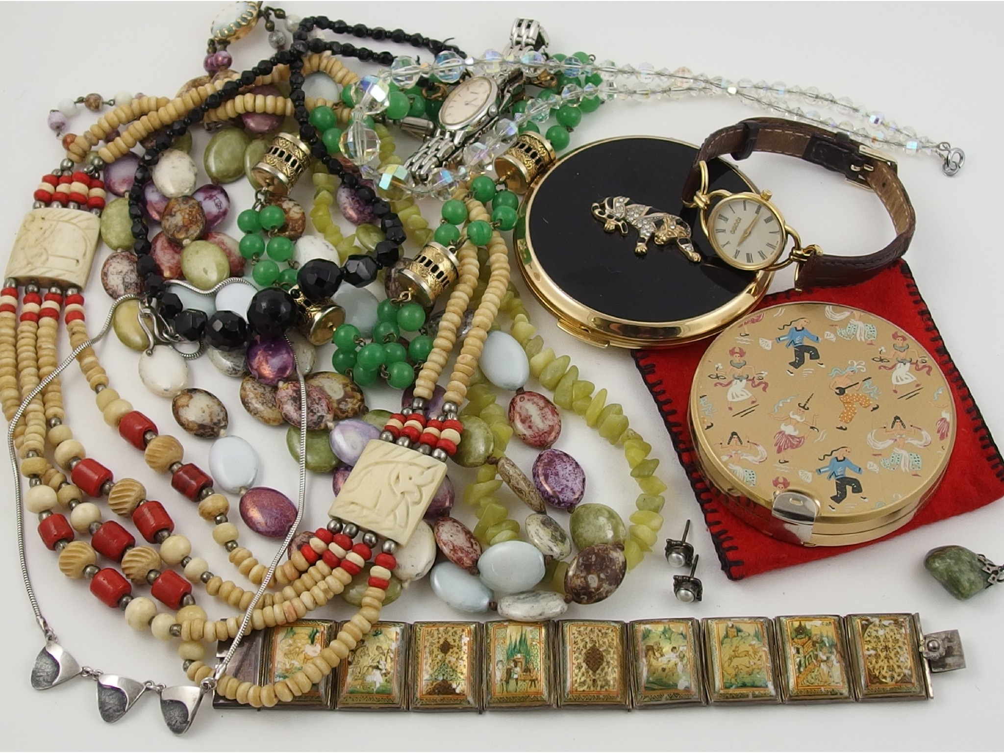 Appraisal: A collection of costume jewellery and compacts to include a