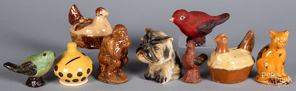 Appraisal: Redware and pottery animal figures and banks Redware and pottery