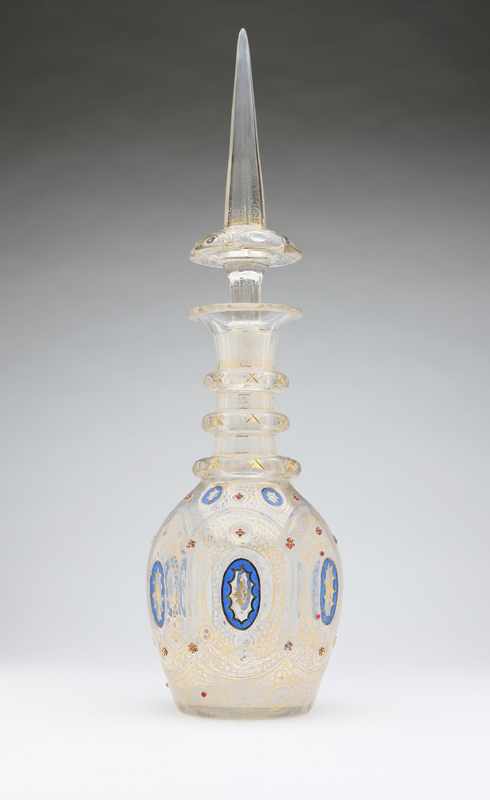 Appraisal: A Bohemian gilt and enameled clear glass decanter and stopper