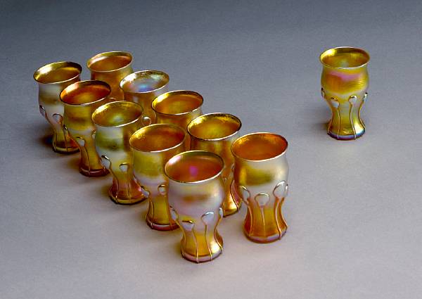 Appraisal: A set of eleven Tiffany Favrile glass small tumblers Early