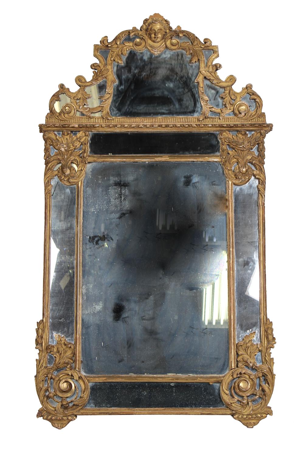 Appraisal: REGENCE STYLE GILTWOOD MIRRORCondition with loss to surmount loss of