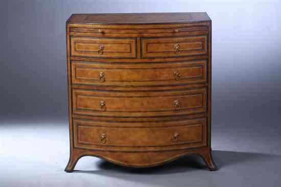 Appraisal: GEORGIAN STYLE LEATHER-COVERED BOW-FRONT BUTLER'S CHEST-OF-DRAWERS by Maitland-Smith Pull-out writing