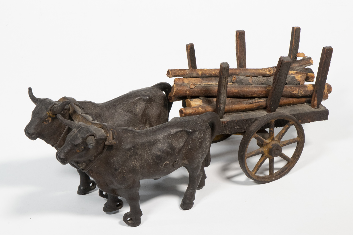 Appraisal: OXEN LOG CART TOY Late th - Early th c