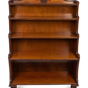 Appraisal: A George IV Carved Mahogany Waterfall Bookshelf In the Manner