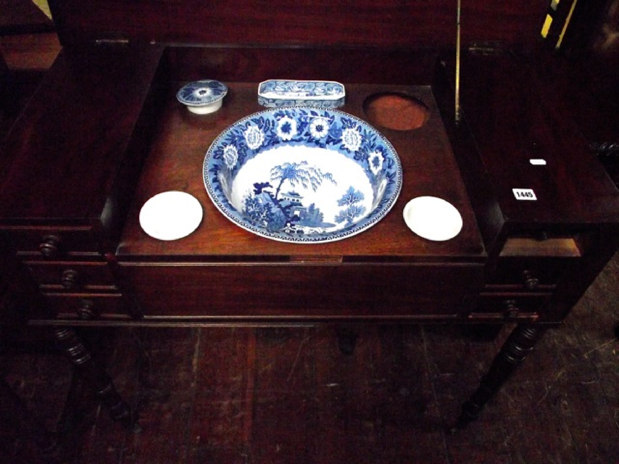 Appraisal: A Georgian mahogany washstand the rising lid revealing a collection