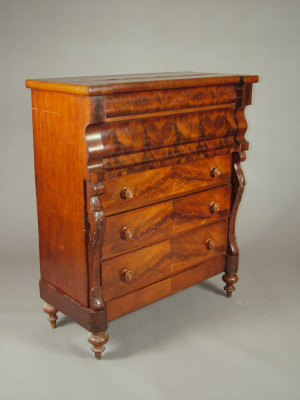 Appraisal: A mahogany chest mid th century of five graduated long