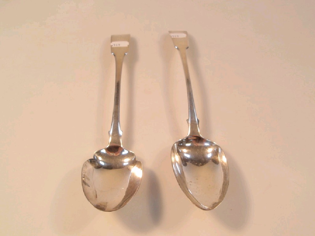 Appraisal: A George III silver fiddle pattern gravy spoon London makers