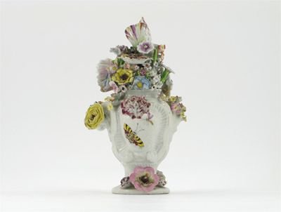 Appraisal: A Longton Hall vase and cover the rococo-moulded body applied