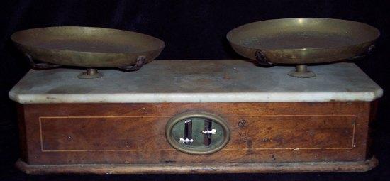 Appraisal: A set of scales with marble top and brass pans