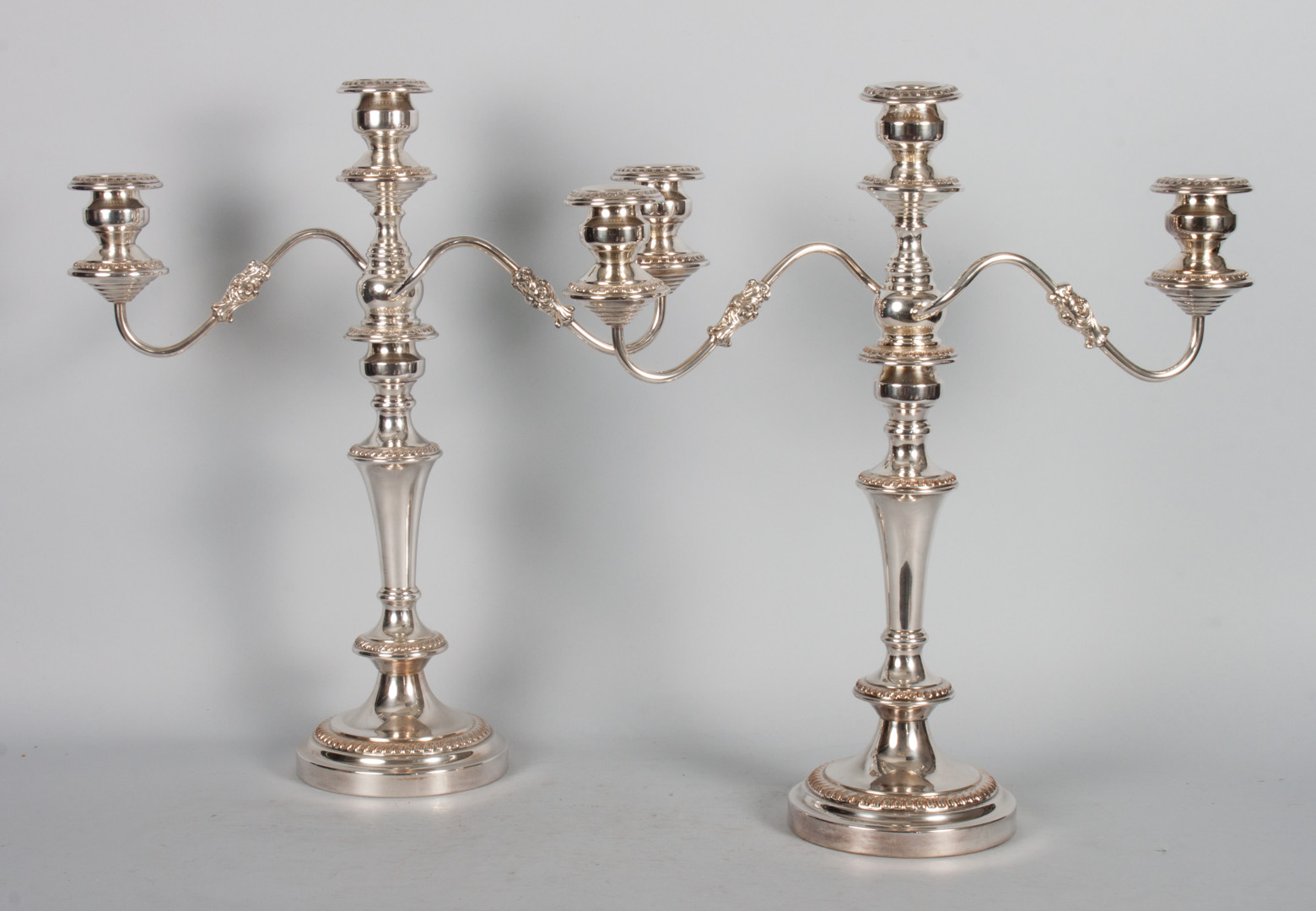 Appraisal: Pair of silver-plated candelabra