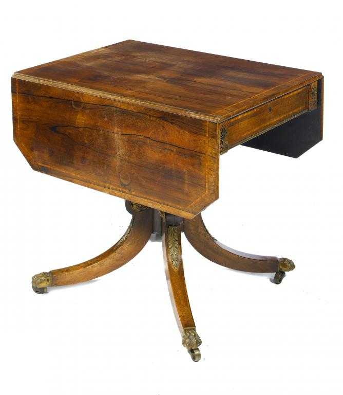 Appraisal: A GEORGE IV ROSEWOOD TABLE the drop leaf top with