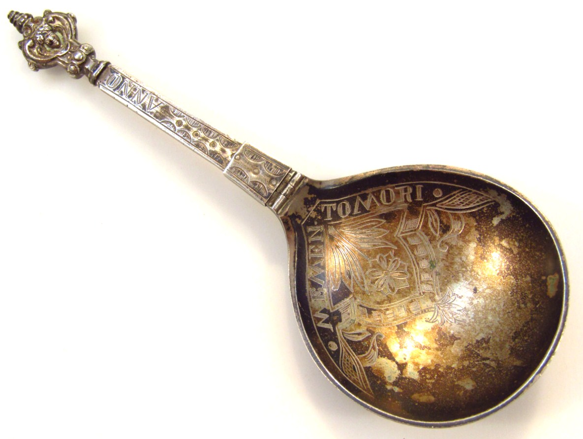 Appraisal: A Norwegian anointing spoon with crown pommel tapering stem and