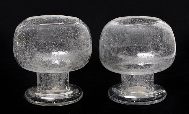 Appraisal: A PAIR OF CLEAR GLASS VASES in globular form on