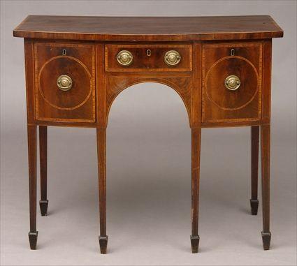 Appraisal: GEORGE III INLAID MAHOGANY BOW-FRONTED SIDEBOARD The satinwood cross-banded top