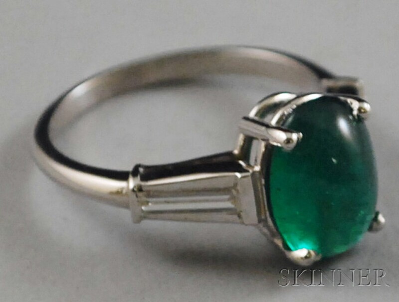 Appraisal: Platinum Emerald and Diamond Ring the cts cabochon emerald flanked