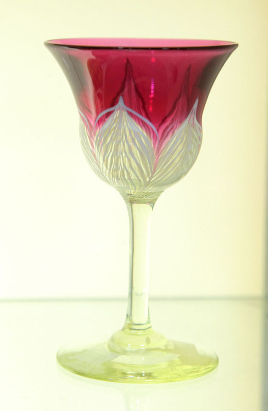 Appraisal: DURAND CORDIAL Cranberry bowl with white and clear pulled feather