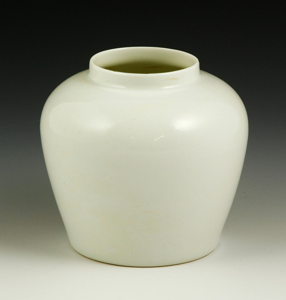 Appraisal: - Chinese Carved White Porcelain Jar Carved white porcelain jar