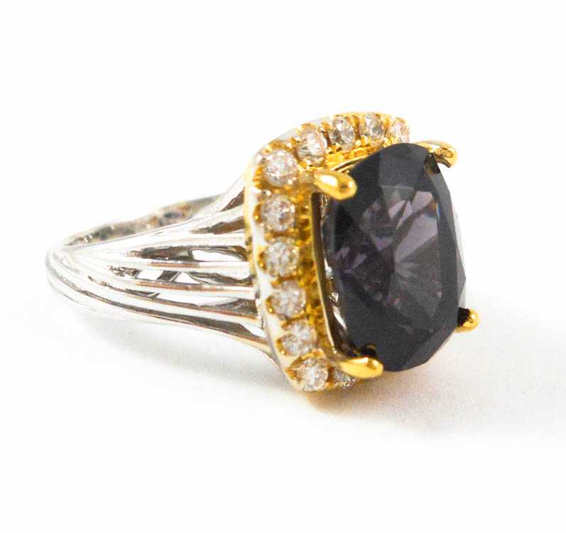 Appraisal: PURPLE SPINEL AND FOURTEEN KARAT GOLD RING The white and