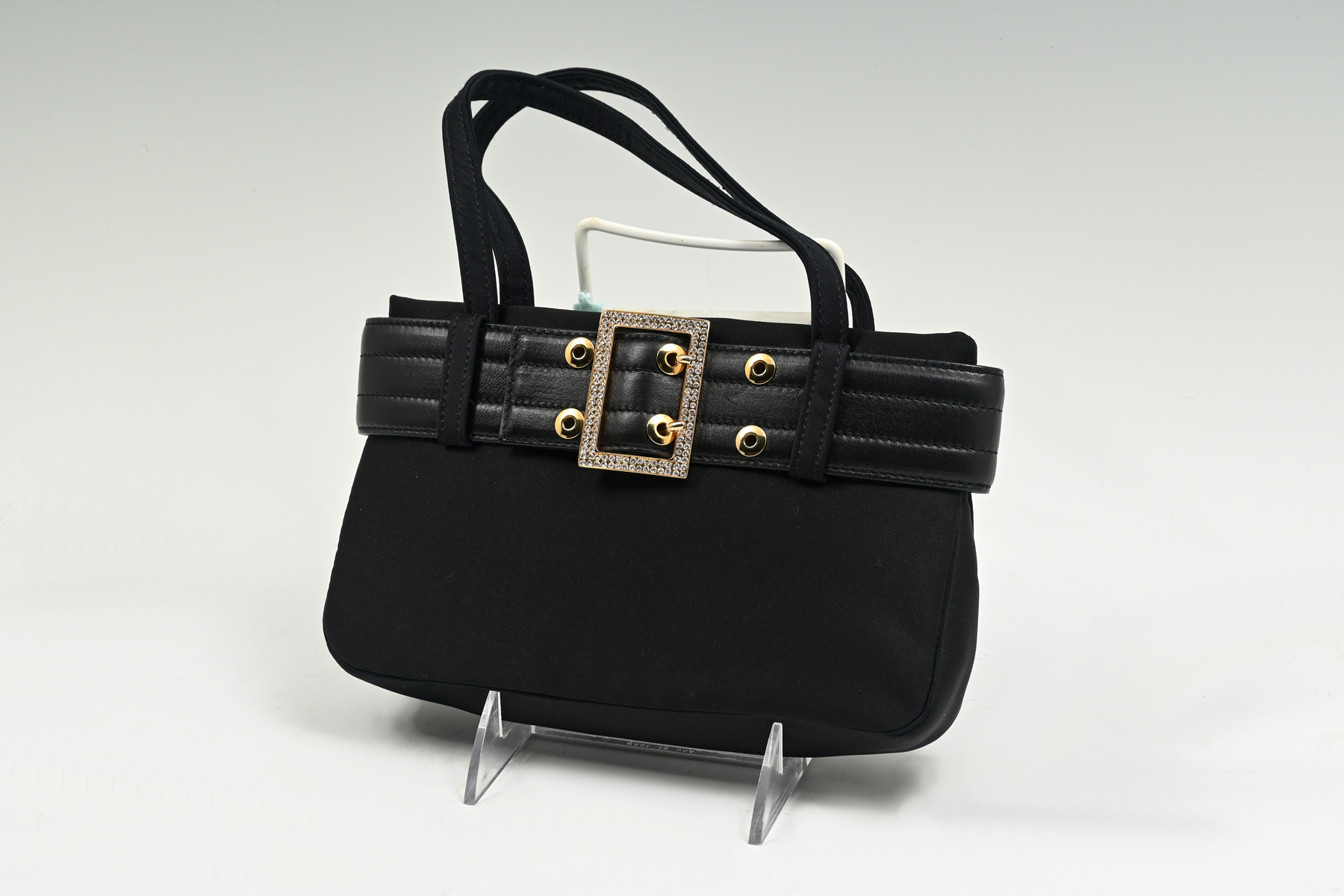 Appraisal: GIANNI VERSACE BLACK SATIN BAG Versace is known for creating