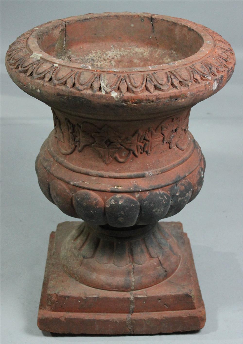 Appraisal: ANTIQUE TERRACOTTA PLANTER WITH MOULDED LEAF DECORATION having an exaggerated