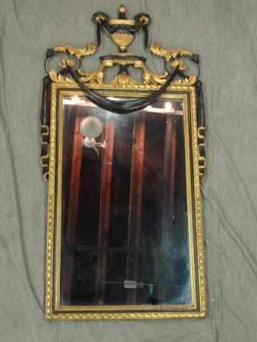 Appraisal: Giltwood Black Mirror with Urn and Tassel Crown From a