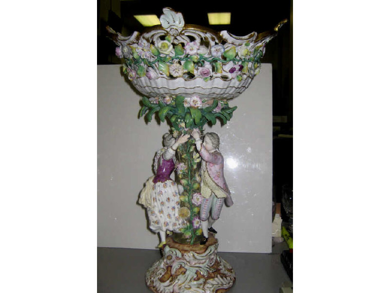 Appraisal: MEISSEN STYLE PORCELAIN FIGURAL COMPOTE Reticulated basket set on a