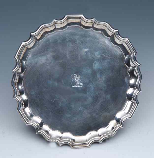 Appraisal: A LATE VICTORIAN SILVER CARD TRAY with a Chippendale border