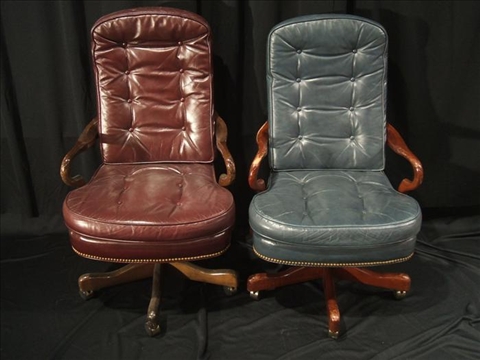 Appraisal: TWO LEATHER OFFICE ARMCHAIRS th c each with button tufted