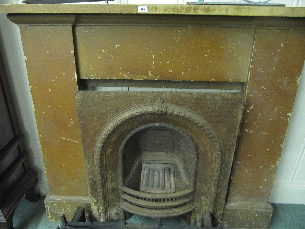 Appraisal: Victorian cast iron fire insert with surround