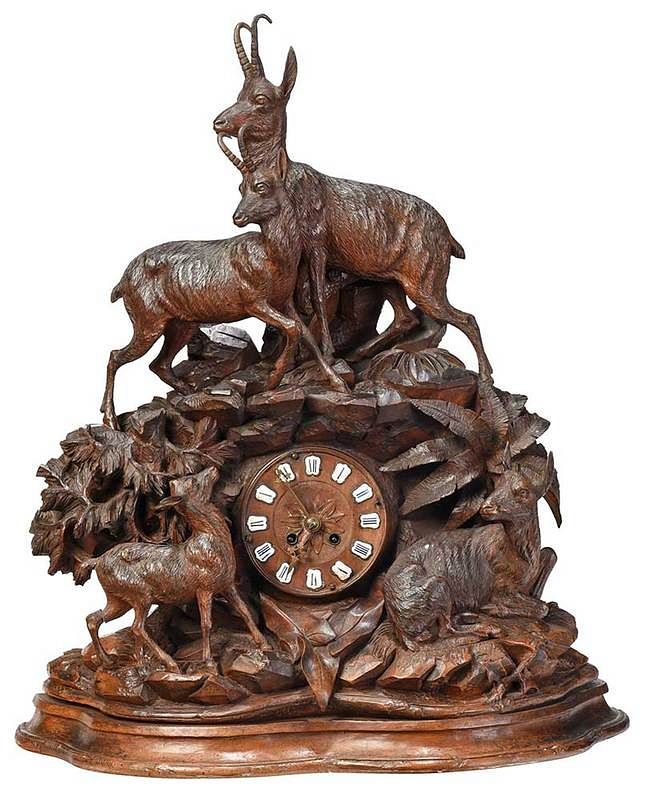 Appraisal: Large Black Forest Carved Figural Mantel Clock Continental late th