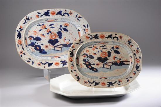 Appraisal: THREE ENGLISH IRONSTONE PLATTERS One shaped rectangular white glazed impressed