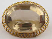 Appraisal: A yellow metal tests carat gold citrine brooch the citrine