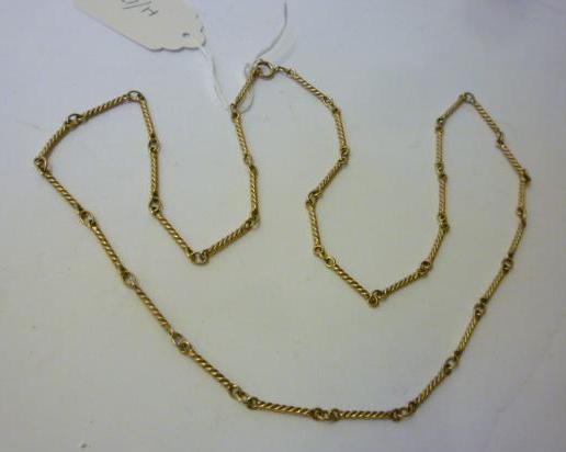 Appraisal: A GOLD CHAIN NECKLACE with twisted links long unmarked gms