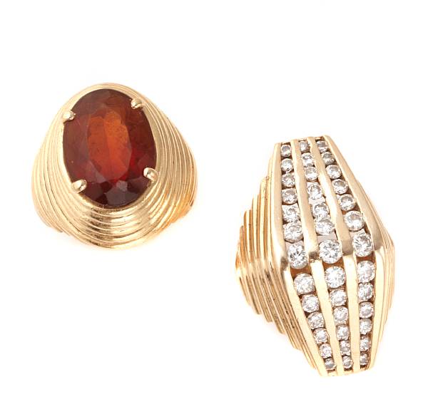 Appraisal: A garnet and k gold ring together with a diamond