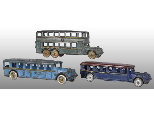 Appraisal: Lot of Cast Iron Bus Toys Description Blue Arcade marked