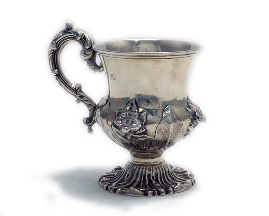 Appraisal: A Victorian silver christening mug with floral and foliate decoration