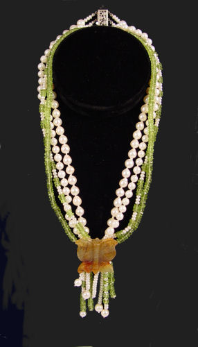 Appraisal: PEARL PERIDOT BEAD NECKLACE strands of pearls a strand of