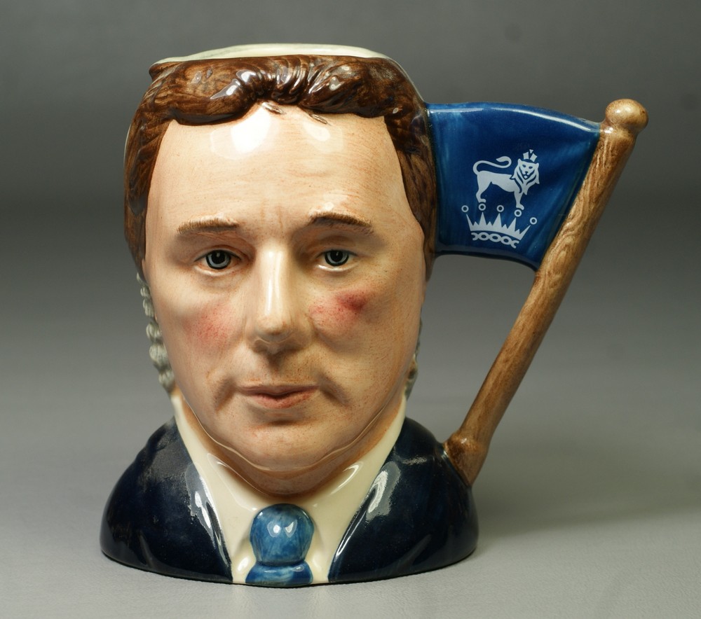 Appraisal: Royal Doulton Double Faced Toby Mug Sir Henry Doulton Michael