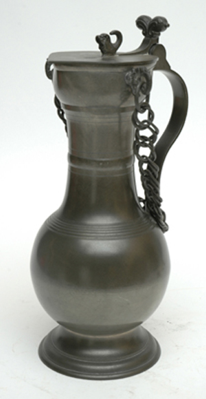 Appraisal: A LATE TH CENTURY PEWTER FLAGON The lobed body beneath