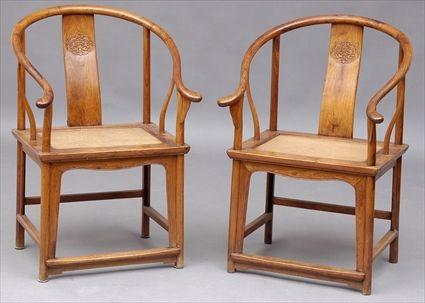 Appraisal: PAIR OF CHINESE HUANG HUALI ARMCHAIRS ach horseshoe shape top