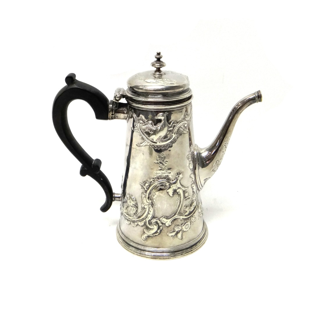 Appraisal: A European silver coffee pot of tapering cylindrical form embossed