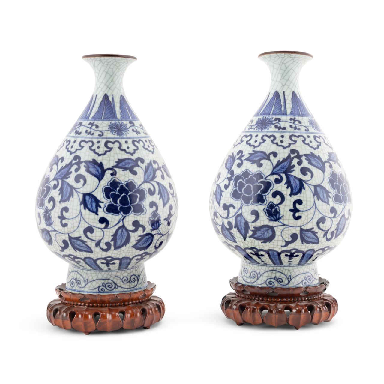 Appraisal: PR CHINESE BLUE WHITE YUHUCHUN VASES ON STANDS Pair of