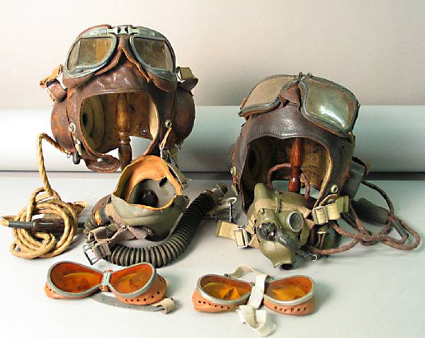 Appraisal: A lot of two World War II flight helmet ensembles