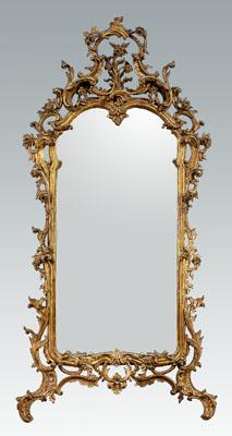 Appraisal: Fine Italian rococo looking glass carved and gilt wood with