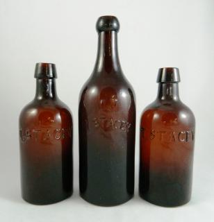 Appraisal: Mineral water bottles Mineral water- round amber 'T Stacey' blob