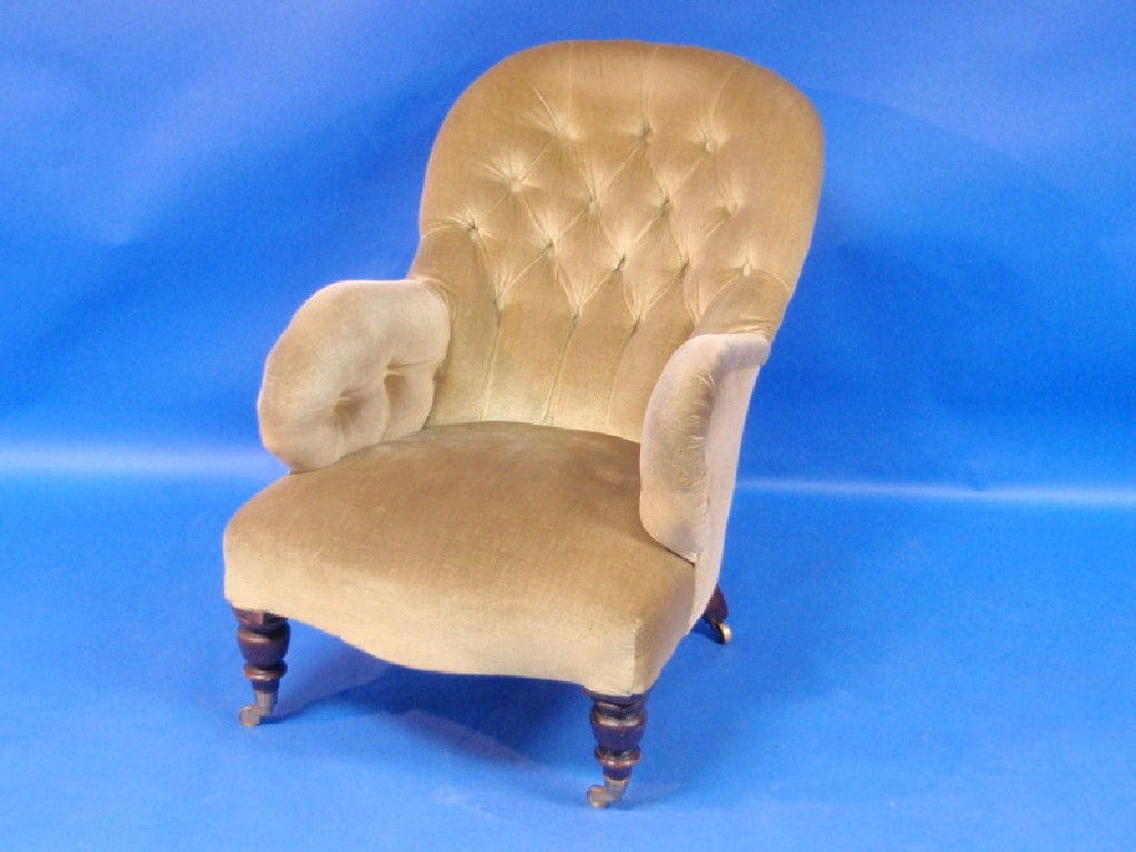 Appraisal: Victorian button-upholstered spoon-back chair padded arms and shaped low seat